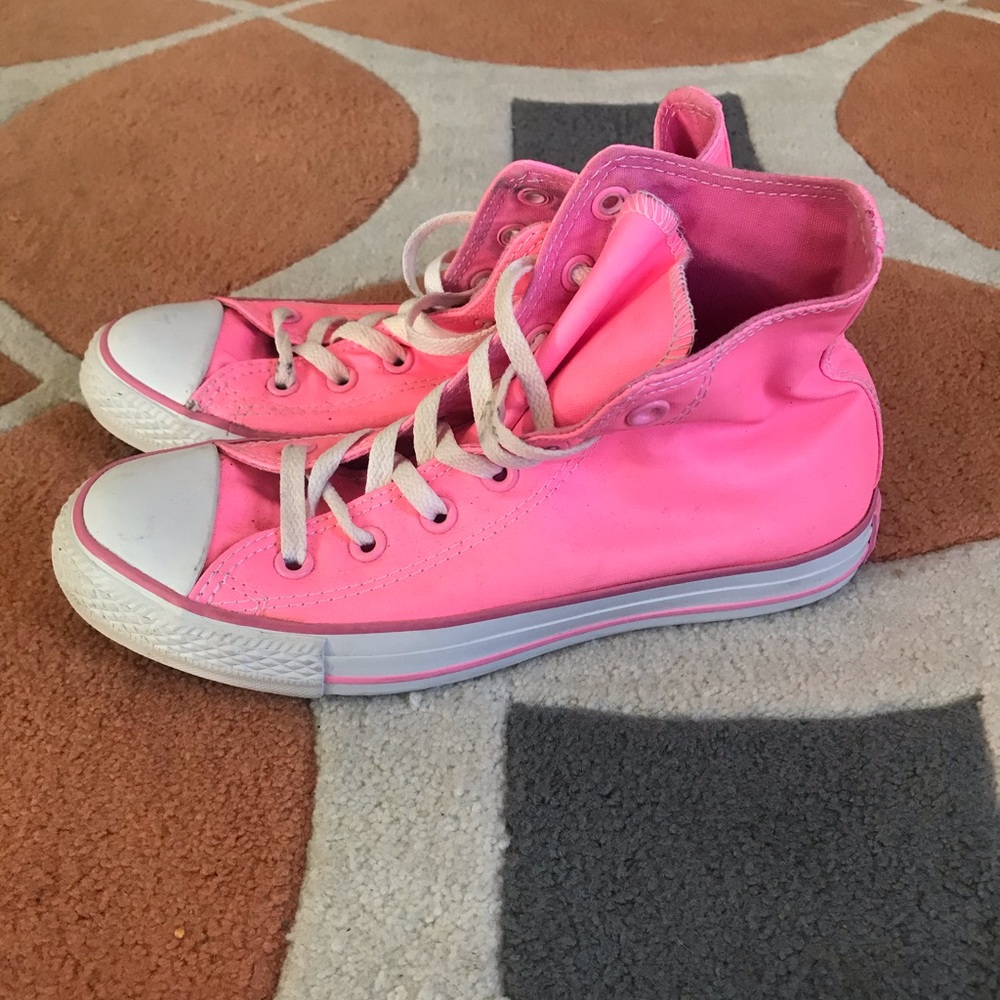 Hot pink glow in the dark high top converse